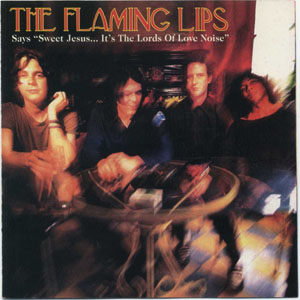 Disco Says "Sweet Jesus... It's The Lords Of Love Noise" de The Flaming Lips